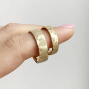 Infinity design couple rings symbolizing eternal love, crafted in sterling silver.