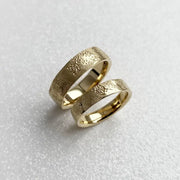 Infinity design couple rings symbolizing eternal love, crafted in sterling silver.