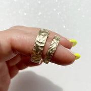 Dual-tone couple rings with modern geometric patterns for stylish partners.