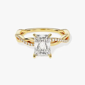Emerald Accented Engagement Ring