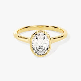 Oval Cut Bezel Set Moissanite Ring