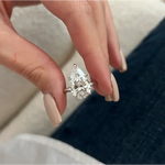 Elegant 5 carat pear cut engagement ring with dazzling center stone