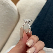 Elegant 5 carat pear cut engagement ring with dazzling center stone