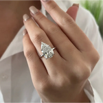 Elegant 5 carat pear cut engagement ring with dazzling center stone