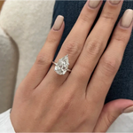 Elegant 5 carat pear cut engagement ring with dazzling center stone