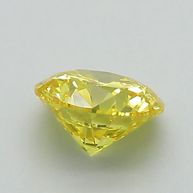 0.90 Carat Round Shape Fancy Vivid Yellow Color Diamond | Round Cut Diamond - Jay Amar Gems