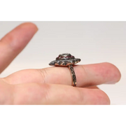 Designer lab created gemstone ring with morganite stone and shimmering diamond accents