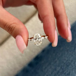 2 carat oval shape lab grown diamond ring with brilliant cut center stone in a classic engagement ring setting
