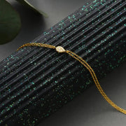 ruby tennis bracelet paired with diamond bracelets womens fashion jewelry and sparkling luxury finish.