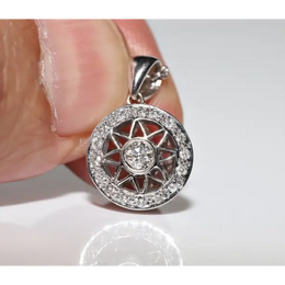 Round halo pendant with lab grown diamond center and green gemstone accents in vintage design