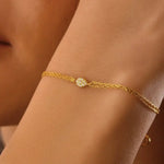 ruby tennis bracelet paired with diamond bracelets womens fashion jewelry and sparkling luxury finish.