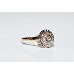 Unique lab grown diamond engagement ring with cushion cut stone in modern gold design