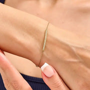 ruby tennis bracelet paired with diamond bracelets womens fashion jewelry and sparkling luxury finish.