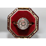 Unique lab grown diamond engagement ring with cushion cut stone in modern gold design