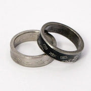 Classic gold couple rings set with subtle diamonds, timeless elegance.