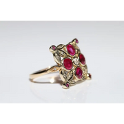 Lab created gemstone diamond ring with pink center stone and sparkling white diamonds in gold setting