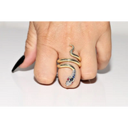 Stylish lab created gemstone ring with ruby red center stone and white diamond halo
