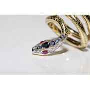 Stylish lab created gemstone ring with ruby red center stone and white diamond halo