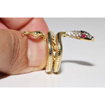 Stylish lab created gemstone ring with ruby red center stone and white diamond halo