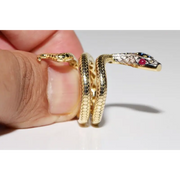 Stylish lab created gemstone ring with ruby red center stone and white diamond halo