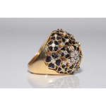 Elegant lab created gemstone ring with blue sapphire center and sparkling white diamonds
