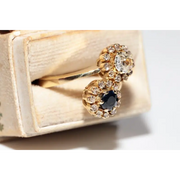 Unique lab created gemstone ring with topaz center stone and white diamond details