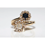 Unique lab created gemstone ring with topaz center stone and white diamond details