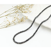 Black beads necklace with natural diamond engagement rings and luxury white gold fine jewelry designs