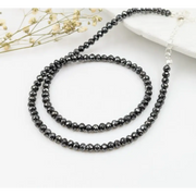 Black beads necklace with natural diamond engagement rings and luxury white gold fine jewelry designs