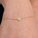 Gold bead bracelet with hand chain bracelet styling and elegant bracelets gold bracelets layering look.