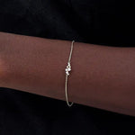 Pandora diamond bracelet paired with womens tennis bracelet and diamond bracelet for women luxury style.