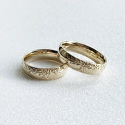 Matching platinum couple rings, timeless design for a perfect symbol of love.