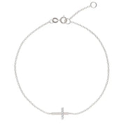 0.60 ct lab grown diamond bracelet for women featuring round brilliant stones in a gold setting.