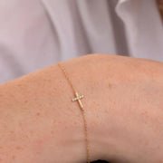 0.60 ct lab grown diamond bracelet for women featuring round brilliant stones in a gold setting.