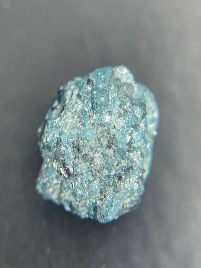 Wedding jewelry starts with this stunning 2.35Ct blue rough diamond.