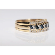 Luxury lab created gemstone ring with emerald cut green stone and diamond accents