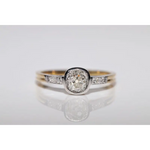 Premium lab grown ring round diamond solitaire in gold setting with elegant and classic look