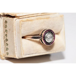 Classic lab created gemstone diamond ring with pink gemstone and sparkling white diamond halo