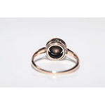 Classic lab created gemstone diamond ring with pink gemstone and sparkling white diamond halo