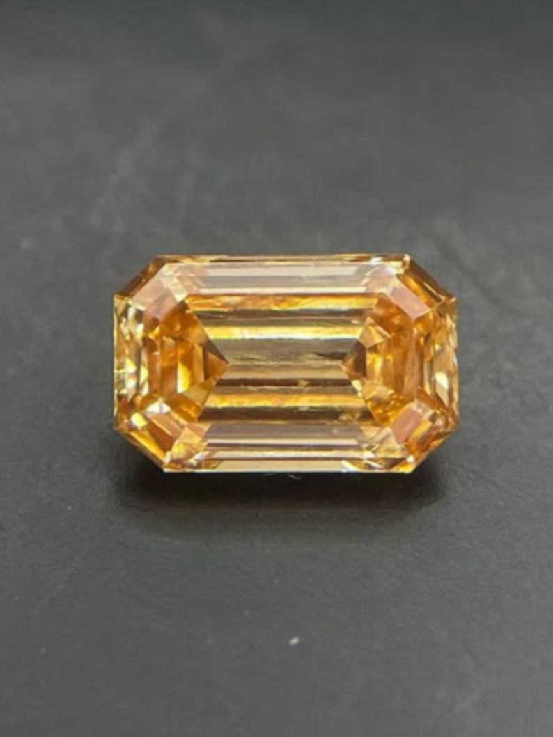 0.56 CT Emerald Cut Lab-Grown Orange Color Diamond
