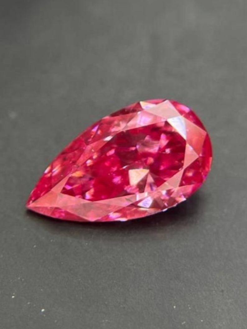 0.45 CT Pear Cut Fancy Vivid Pink Lab Grown Diamond