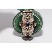 Modern lab created gemstone diamond ring with pear shape pink stone and white diamond accents