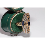 Modern lab created gemstone diamond ring with pear shape pink stone and white diamond accents