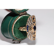 Modern lab created gemstone diamond ring with pear shape pink stone and white diamond accents