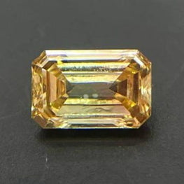 0.20 CT Orangish Green Mixed Emerald Cut Lab Grown Diamond
