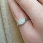 Personalized dainty gold initial ring with sleek signet style, elegant alphabet jewelry for women