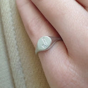 Personalized dainty gold initial ring with sleek signet style, elegant alphabet jewelry for women