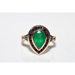 Modern lab created gemstone ring with aquamarine center and brilliant white diamonds
