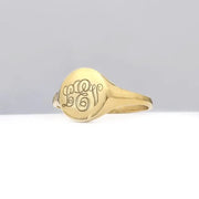 Custom gold initial ring for women with delicate alphabet engraving and sleek signet design