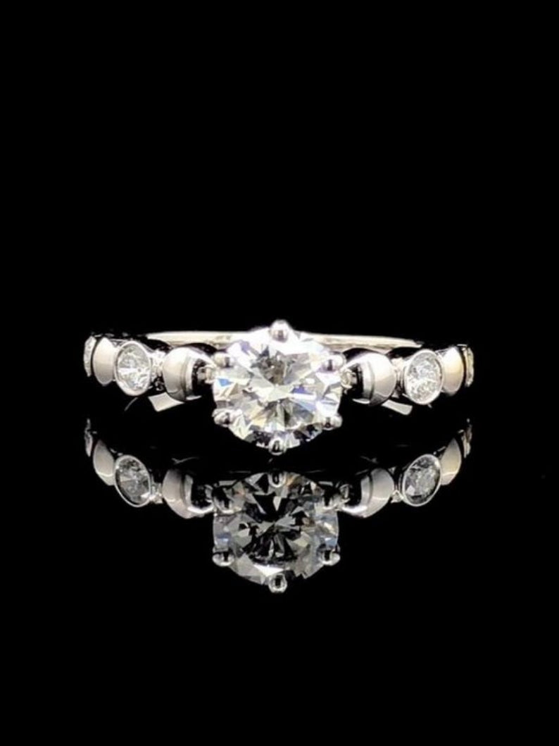 Elegant Round Cut Bezel Delicate Ring